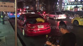 Tired Taxi Driver Naps On His Car Boot