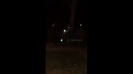 Green Flamed Fire Spinning Nunchucks by Joey Finocchiaro