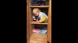 Toddler climbes in a closet and gets stuck