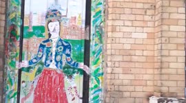 Abandoned row of houses in Liverpool now decorated by locals with exotic graffiti