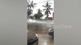 Volcanic ash covers cars in the Philippines as Taal rumbles