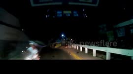 Filipino motorcycle sidecar clips oncoming motorist on road bend