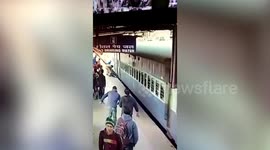 Alert railway guards save elderly man who fell while boarding moving train in eastern India