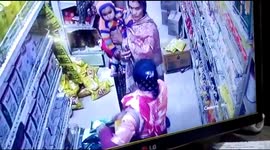 Two women caught hiding stolen cosmetics and food in their clothes and bags at Indian mall
