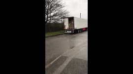 Group of men seen running away after jumping out the back of a truck in UK