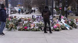 Toronto memorial for Iran Ukrainian airlines flight PS752 crash victims with flowers, candles and photographs of the many Canadian victims many of whom were college, university and high school students.  (ver.1)