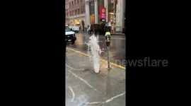 Water surges from the ground in San Francisco amid heavy rain