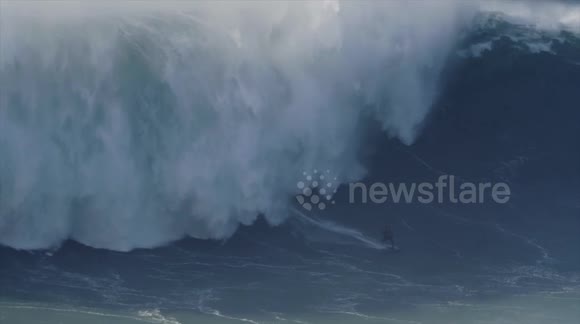 Brazilian surfer Felipe Cesarano flattened by monster 60ft wave at Nazare