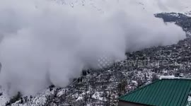 Watch - Snow avalanche coming down from mountains in Kinnaur turned it route escaping villagers .