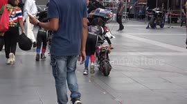 Cute Children Ride Mini Motorbikes At Festival