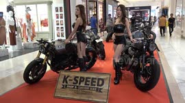 Models Promote Latest Motorbikes From Leading Companies