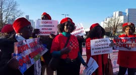 Ugandans protest against country's government outside UK-Africa business summit venue in London