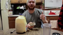Man Enjoys a Milkshake.......Made of Catfood
