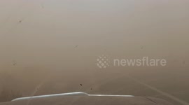 Huge dust storm forces South Australian family to wait inside vehicle for nine minutes