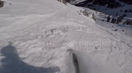 Newsflare Edit - Skier hits huge cliff and almost lands on rocks