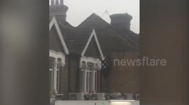 This is the moment police captured a man who was running across rooftops in east London after allegedly assaulting a police officer