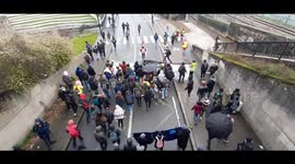 Thousands march through Nantes against Macron's pension reform.