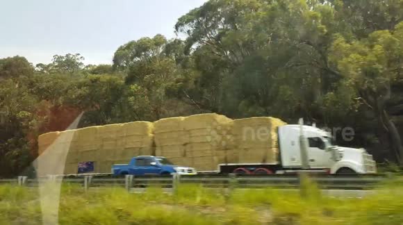 180 truck convoy donates hay to drought affected farmers  north of Sydney Australia
