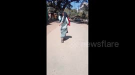 Father carries sick daughter on shoulders after Indian hospital refuses to provide them with wheelchair