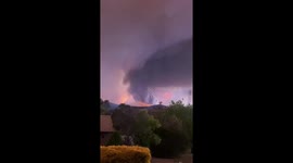 Sun setting over the Orroral Valley Fire near Canberra