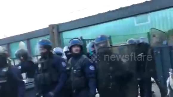 Demonstration in France in Rennes where helmeted police officers are responsible for monitoring students.