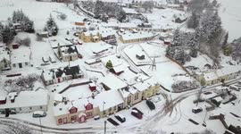 Residents in south Scotland find their towns, roads and vehicles blanketed in snow