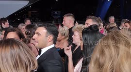 Olivia Bucklands Husband Keeps Her Warm On the Red Carpet of The NTA Awards  