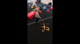 Toddler trips over gymnastics equipment