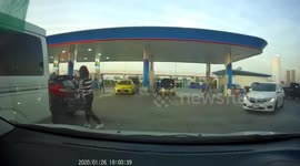 Woman Deals With Car Blocking Her By Pushing It With Feet