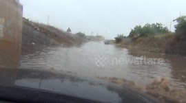 Stormchaser gets stranded in deep water when car stalls during floods in central Italy
