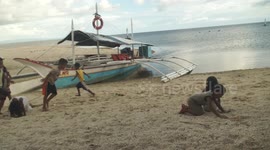 Filipino children play on their home island