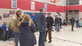 Iowa Caucuses: Caucus participants gather in school gymnasium in Des Moines