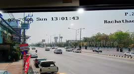 Ambulance swerves to avoid minivan doing u-turn but crashes into pavement