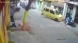 Driving lesson gone wrong: Young learner accidentally accelerates and crashes into his neighbours in south India