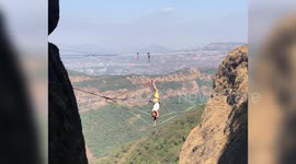 Adrenaline junky uses special slackline to spin around 164 feet in the air