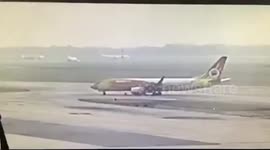 Plane crushes tow truck when being dragged to gate at Thai airport, killing one