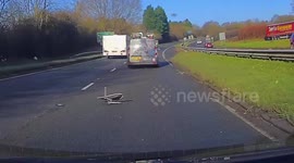 Terrifying moment satellite dish falls from Sky van on UK road