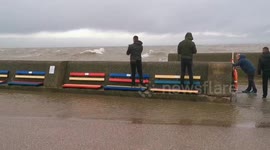 Storm ciara bystander gets swept away by a wave new brighton wirral