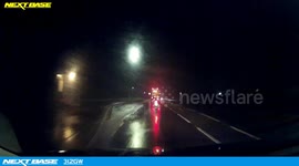 Mad man in mph Winds on a motor bike