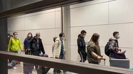 Passengers of World Dream leaving Kai Tak Cruise Terminal on 9 February 2020 after being quarantined for 5 days