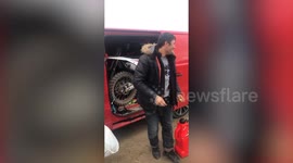 Moment group of UK friends find two Afghan migrants hiding in the back of their van asking 'in England?'