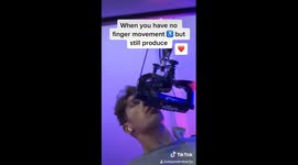 Quadriplegic with no finger movement producing music