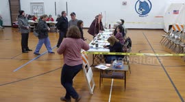 Democrat voters arrive at New Hampshire polling station ahead of primary election