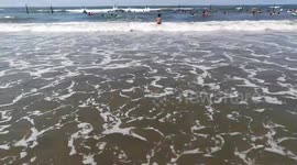 Little Boy Faces Big Waves In Ras El Bar Egypt