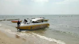 Police investigate after tourist is found floating in sea with rock tied to neck