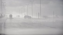 Cars and fire engine battered by crashing waves on Cleveleys seafront in wake of Storm Ciara