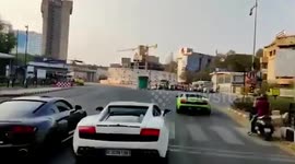 Newsflare Edit - Lamborghini driver loses control and crashes into traffic police kiosk in southern India