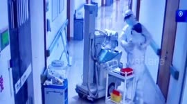 Chinese couple fighting coronavirus hug after not seeing each other for five days