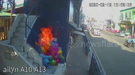 Street vendor survives flames after pranksters set fire to his balloons