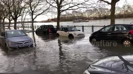 Putney road and park flooded by very high tide